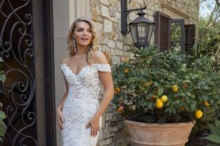 vestido de novia con encaje y cola