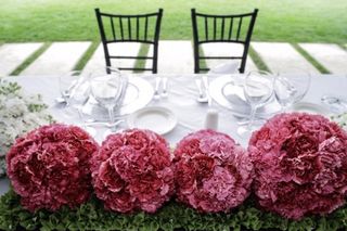 topiarios de flores para decoración de boda
