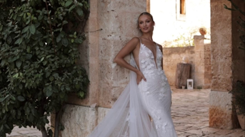 Vestido de novia corte sirena con capa 