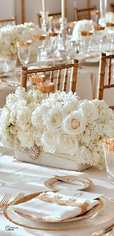 Ideas para centros de mesa con flores blancas 6
