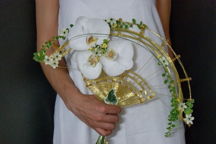 ¿Cambiarías el ramo por un abanico de novia como estos? 4